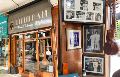 The storefront and the inside of Rikhi Ram Musical Instruments with the memorabilia from the Beatles visit still intact (credit: Nishant Mittal).